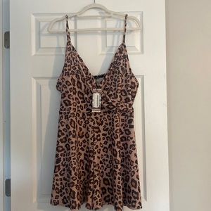 Brand new with tags Leapord Romper.
